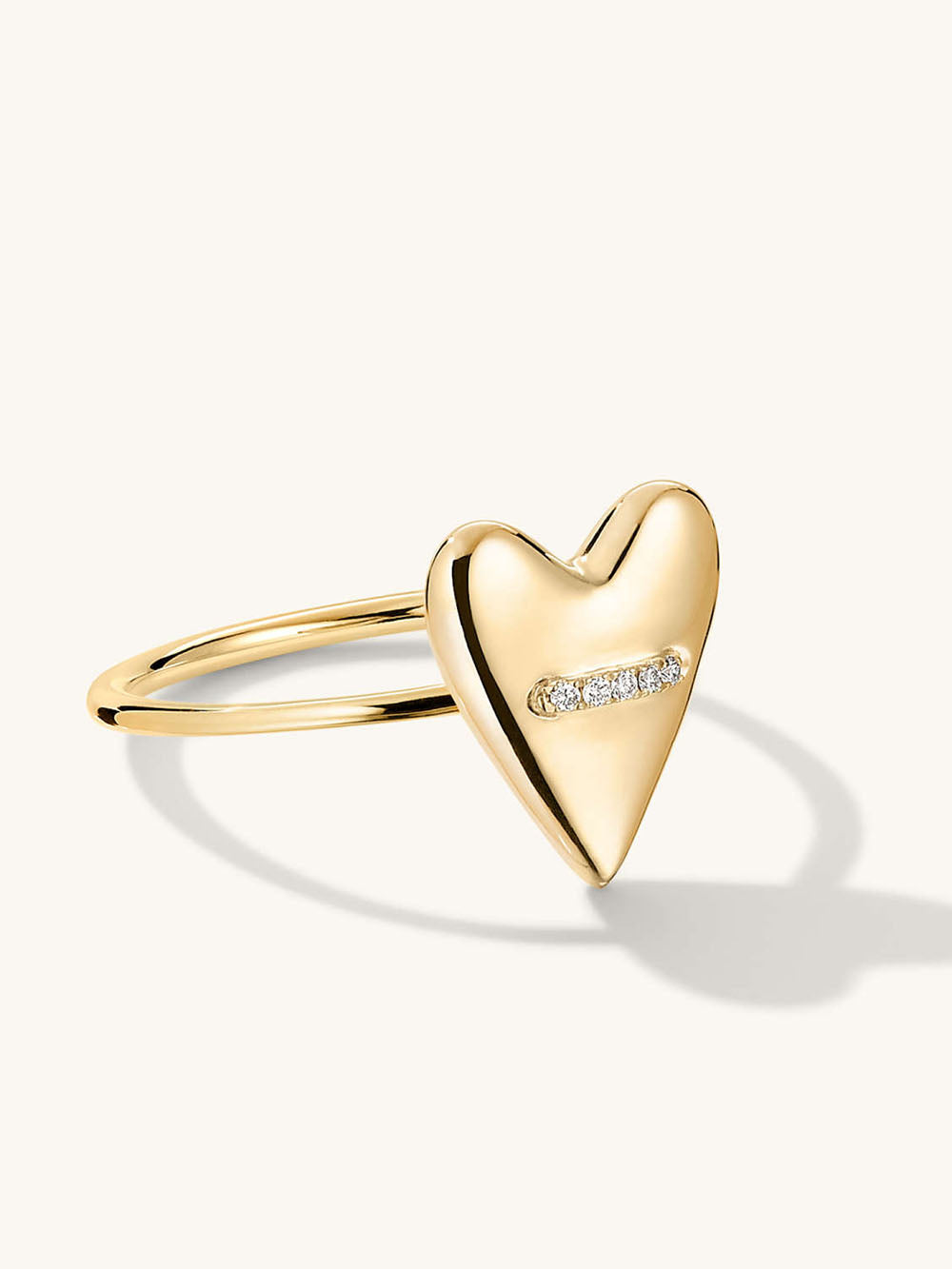 Image of slim ring with heart shape and set of diamonds