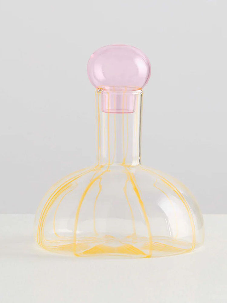 Clear decanter vase with pink and yellow detailing